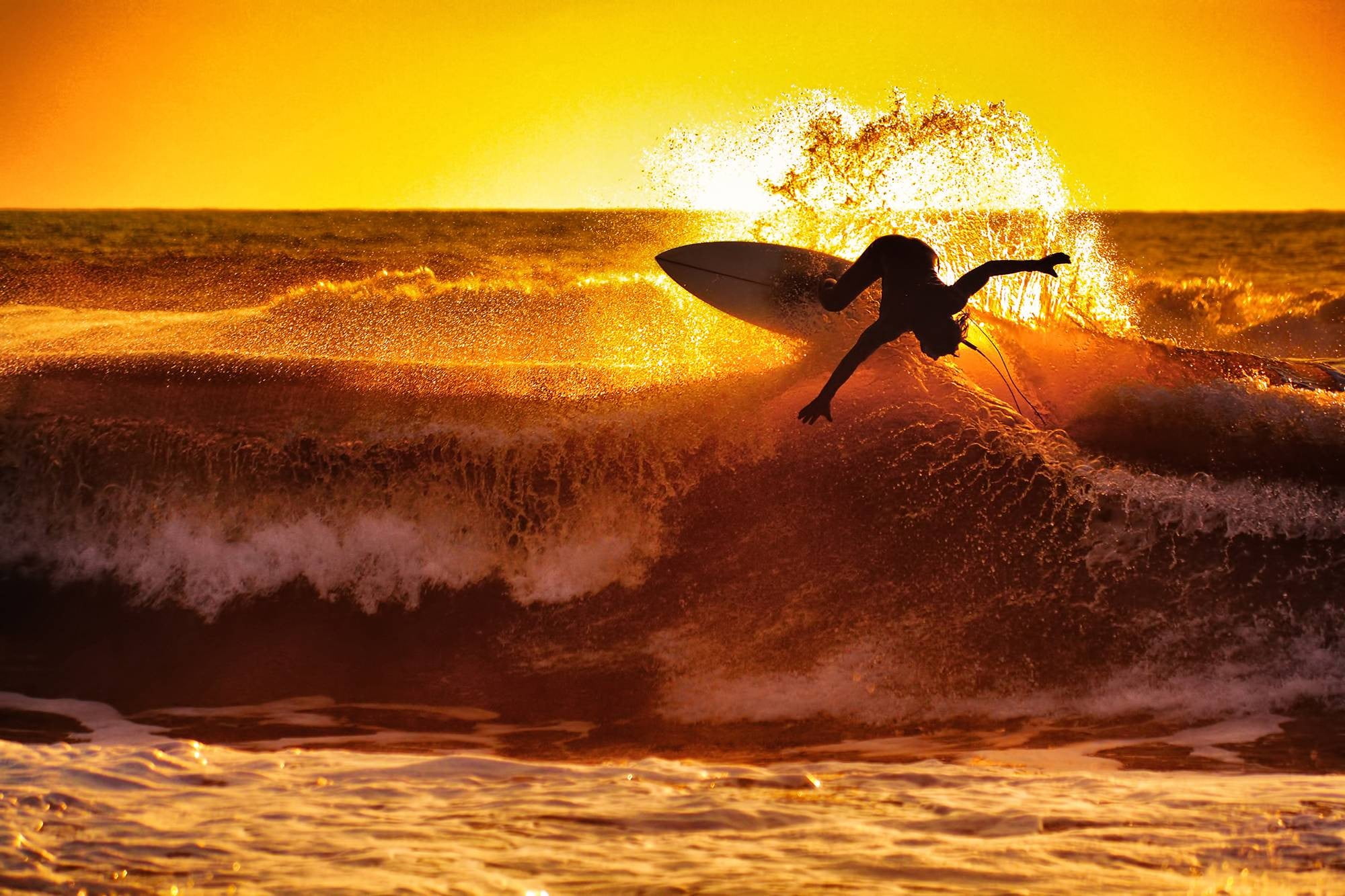 surfing-waves-sunset-white-wallpaper.jpg