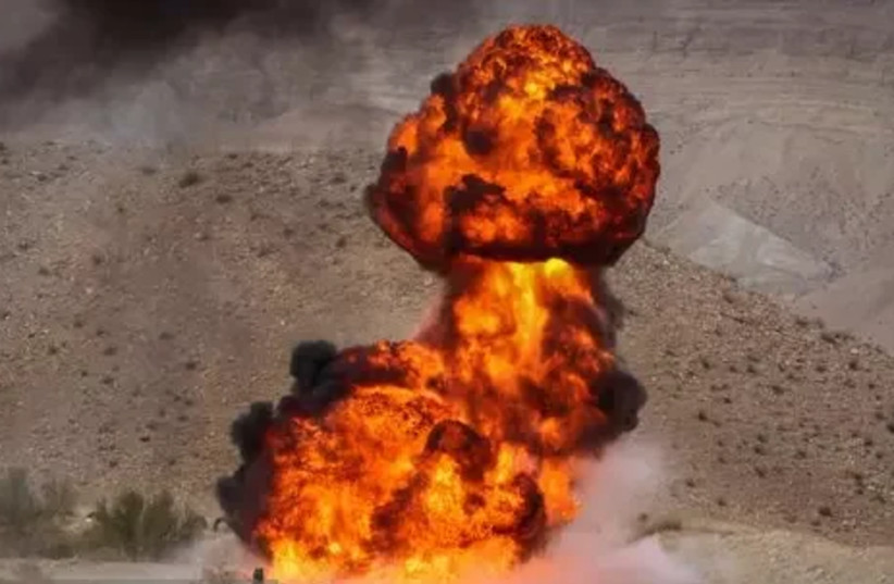  An explosion is seen at an Iranian missile and drone test at the 17th Great Prophet drill in Iran. (photo credit: Ali Yeghane Lari/Mehr News Agency)