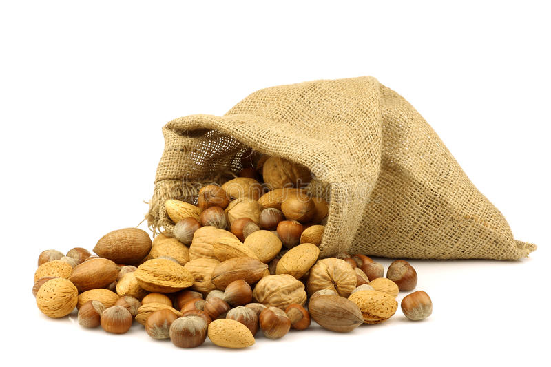 assorted-nuts-coming-out-burlap-sack-18415570.jpg